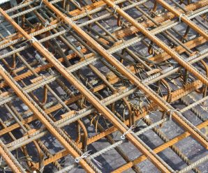 What are the types of steel reinforcement within concrete building?